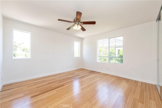 120 Rue Monet, Lake Forest, CA 92610 - empty room featuring healthy amount of natural light, light wood-type flooring, and a ceiling fan