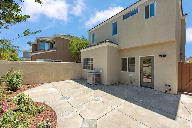 120 Rue Monet, Lake Forest, CA 92610 - rear view of property with stucco siding and a patio area