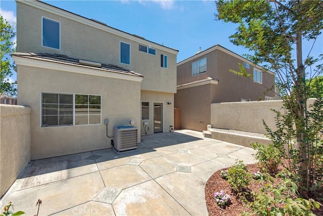 120 Rue Monet, Lake Forest, CA 92610 - back of house featuring stucco siding, a fenced backyard, and a patio area