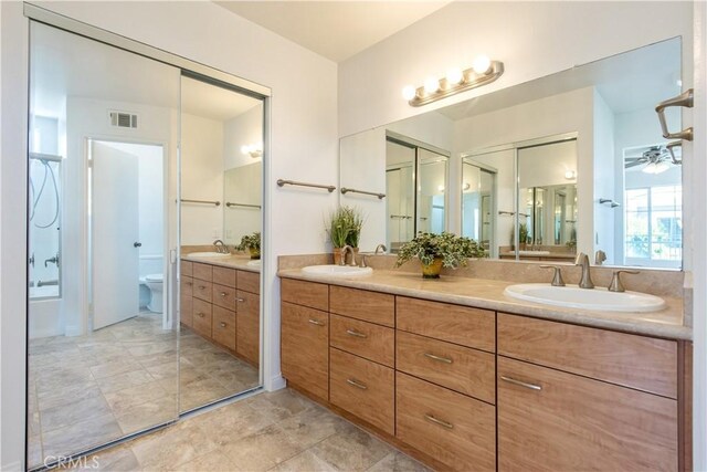 120 Rue Monet, Lake Forest, CA 92610 - bathroom with double vanity and a ceiling fan