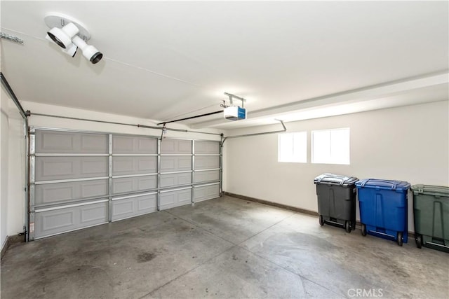 120 Rue Monet, Lake Forest, CA 92610 - garage with a garage door opener and baseboards