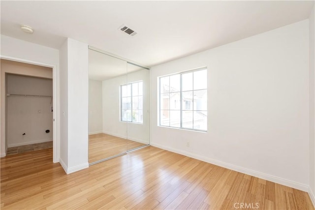 120 Rue Monet, Lake Forest, CA 92610 - unfurnished bedroom with a closet and light wood-style flooring