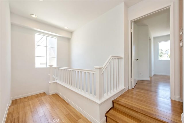 120 Rue Monet, Lake Forest, CA 92610 - stairs featuring hardwood / wood-style flooring and baseboards