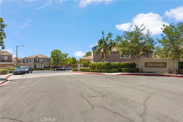 120 Rue Monet, Lake Forest, CA 92610 - view of asphalt street featuring street lights, sidewalks, a residential view, and curbs
