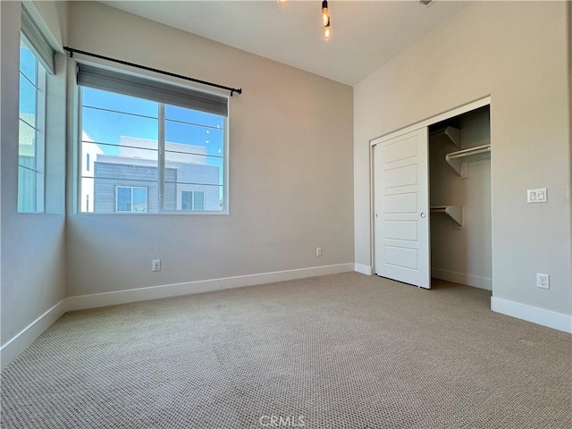 325 Sawbuck, Irvine, CA 92618 - unfurnished bedroom with carpet floors, multiple windows, and a closet