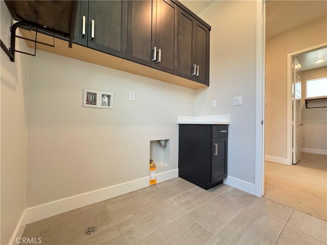 325 Sawbuck, Irvine, CA 92618 - laundry area featuring cabinet space, washer hookup, light tile patterned floors, and light carpet