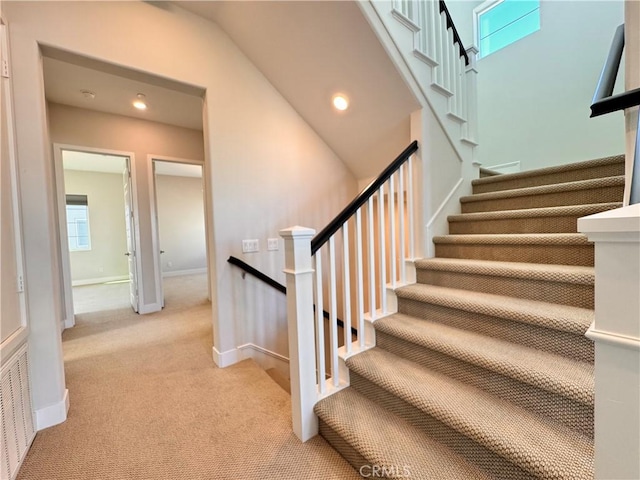 325 Sawbuck, Irvine, CA 92618 - staircase featuring carpet floors and recessed lighting
