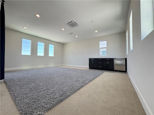 325 Sawbuck, Irvine, CA 92618 - spare room featuring light carpet and recessed lighting