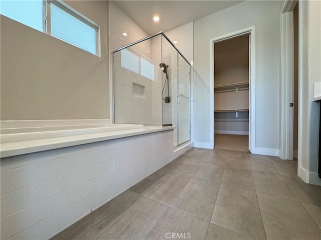 325 Sawbuck, Irvine, CA 92618 - bathroom with a shower stall, tile patterned flooring, a walk in closet, and recessed lighting