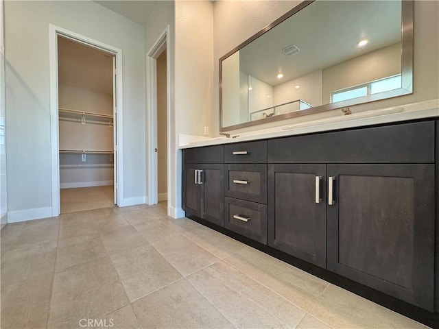 325 Sawbuck, Irvine, CA 92618 - full bath featuring double vanity, tile patterned floors, and a spacious closet