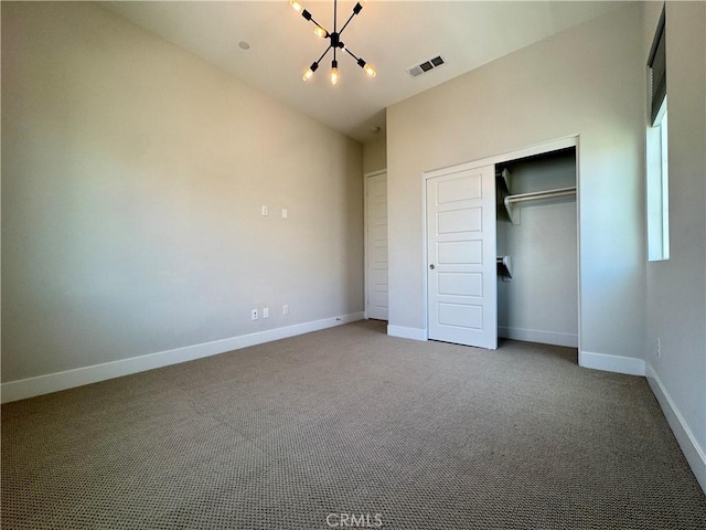325 Sawbuck, Irvine, CA 92618 - unfurnished bedroom featuring a chandelier, carpet, and a closet