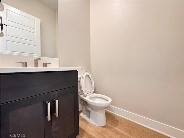 325 Sawbuck, Irvine, CA 92618 - half bath featuring vanity and wood finished floors