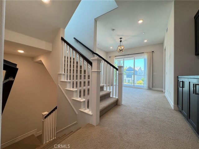 325 Sawbuck, Irvine, CA 92618 - stairway with carpet and recessed lighting