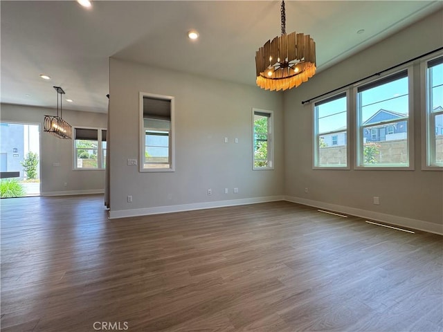 325 Sawbuck, Irvine, CA 92618 - empty room featuring a chandelier, dark wood finished floors, and recessed lighting