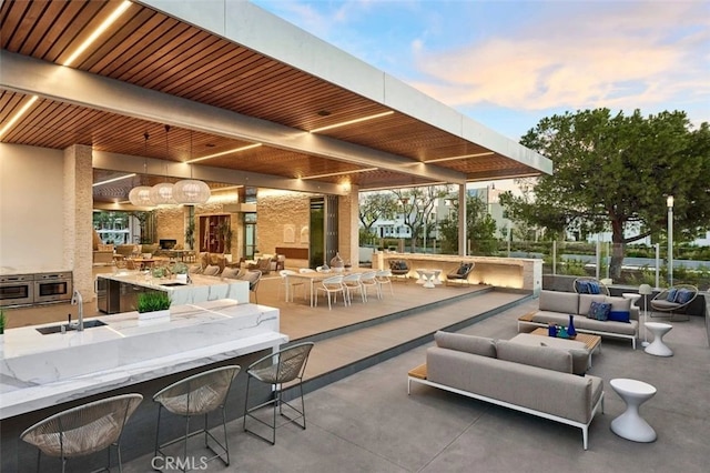 325 Sawbuck, Irvine, CA 92618 - view of patio with outdoor lounge area, a bar, and area for grilling