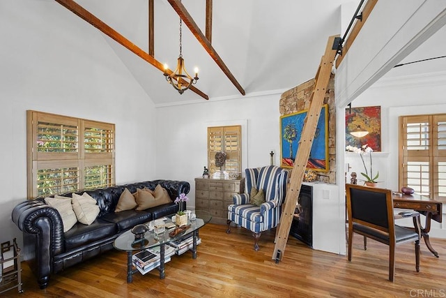 1683 Linwood St, San Diego, CA 92103 - living room featuring a chandelier, high vaulted ceiling, wood finished floors, and beam ceiling