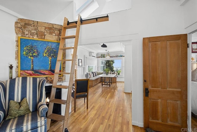 1683 Linwood St, San Diego, CA 92103 - entrance foyer with light wood-style floors and ornamental molding
