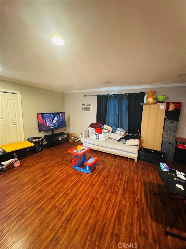 7411 Elsie St, Los Angeles, CA 90001 - living area featuring wood finished floors, crown molding, and a wall mounted AC