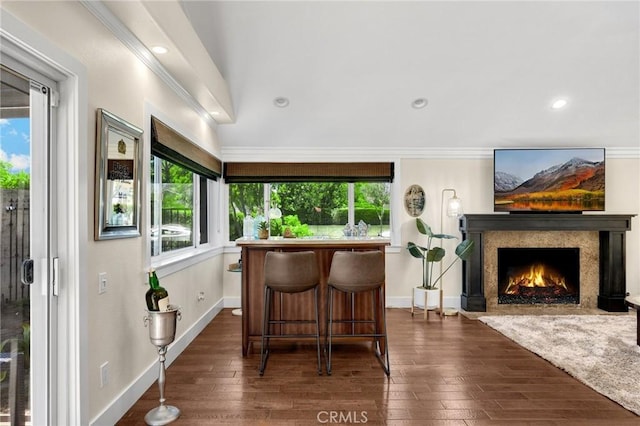 772 N Malden Ave, Fullerton, CA 92832 - bar area featuring ornamental molding, dark wood finished floors, recessed lighting, and a high end fireplace