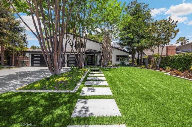772 N Malden Ave, Fullerton, CA 92832 - view of front of home featuring concrete driveway and stucco siding