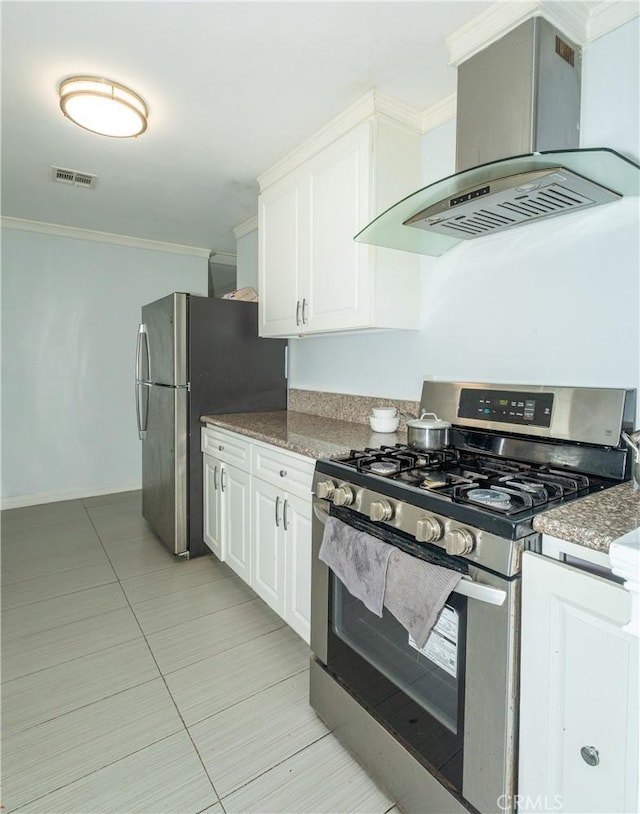 2820 S M St, Oxnard, CA 93033 - kitchen with stainless steel appliances, wall chimney range hood, crown molding, white cabinets, and light tile patterned flooring