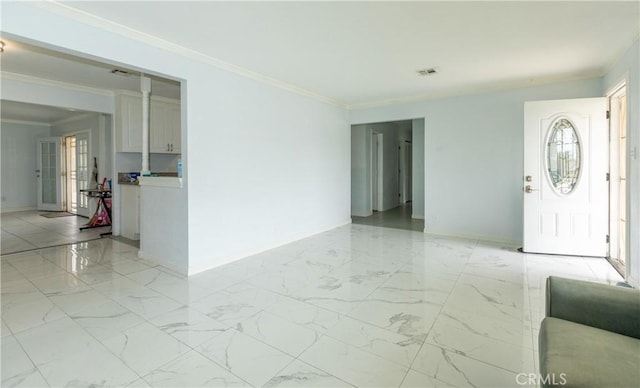 2820 S M St, Oxnard, CA 93033 - foyer with ornamental molding, healthy amount of natural light, and light marble finish flooring