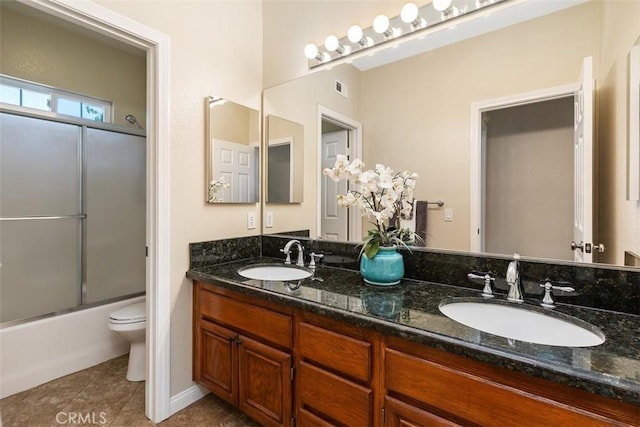 32974 Anasazi Dr, Temecula, CA 92592 - full bathroom featuring double vanity, tile patterned flooring, and shower / bath combination with glass door