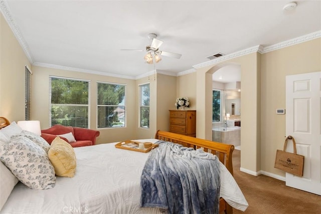 32974 Anasazi Dr, Temecula, CA 92592 - bedroom featuring arched walkways, carpet floors, ornamental molding, ensuite bathroom, and ceiling fan