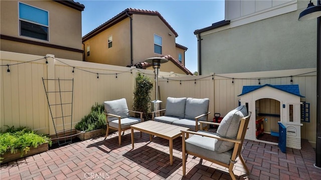 4173 Horvath St Unit 105, Corona, CA 92883 - fenced backyard with a patio and an outdoor hangout area