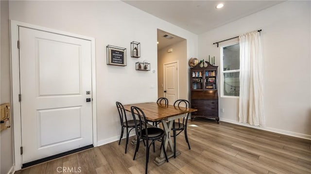 4173 Horvath St Unit 105, Corona, CA 92883 - dining room featuring wood finished floors and recessed lighting