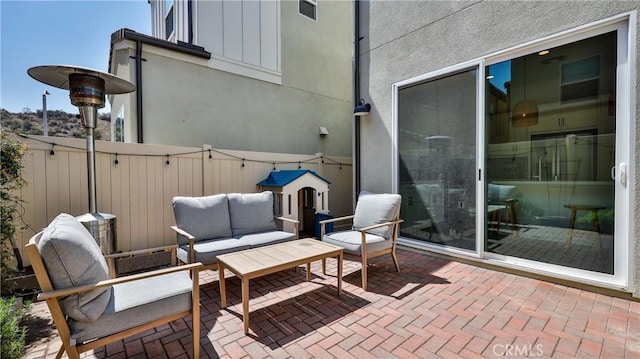 4173 Horvath St Unit 105, Corona, CA 92883 - view of patio / terrace featuring an outdoor living space