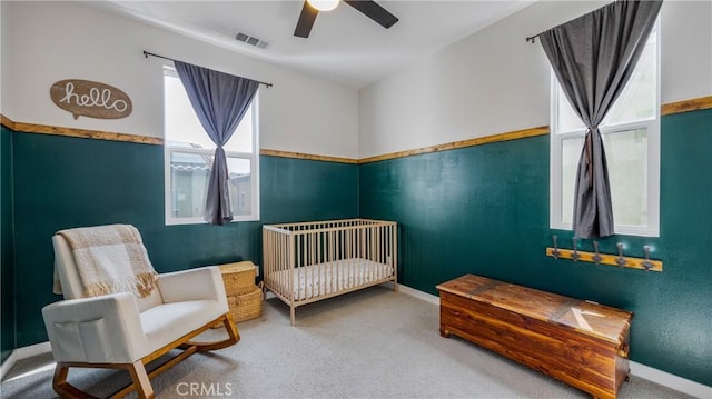 4173 Horvath St Unit 105, Corona, CA 92883 - carpeted bedroom featuring a crib and a ceiling fan