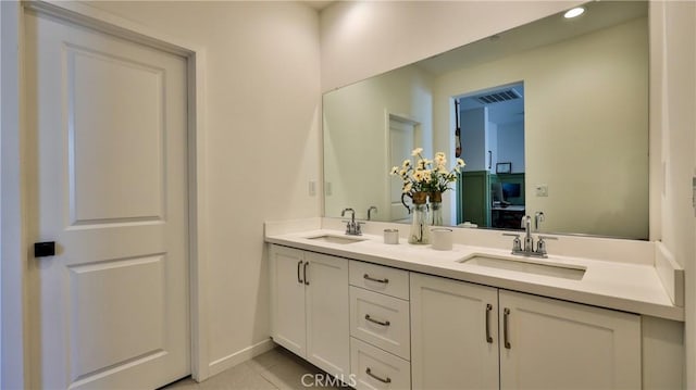 4173 Horvath St Unit 105, Corona, CA 92883 - full bath with double vanity, tile patterned floors, and recessed lighting