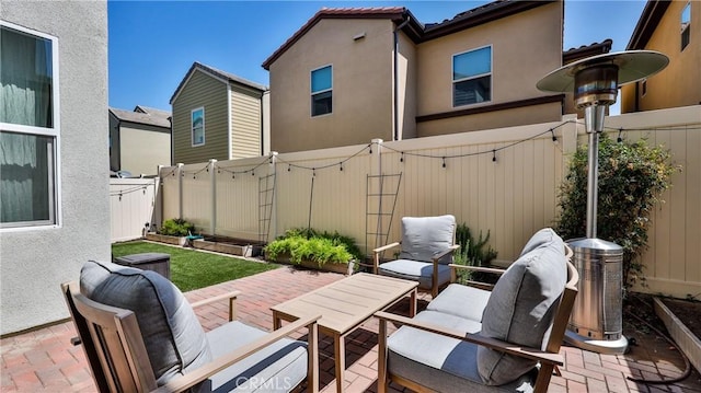 4173 Horvath St Unit 105, Corona, CA 92883 - fenced backyard featuring a patio and an outdoor living space