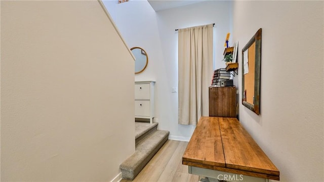4173 Horvath St Unit 105, Corona, CA 92883 - hallway featuring wood finished floors and baseboards
