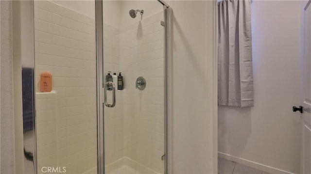 4173 Horvath St Unit 105, Corona, CA 92883 - bathroom with a stall shower and tile patterned floors