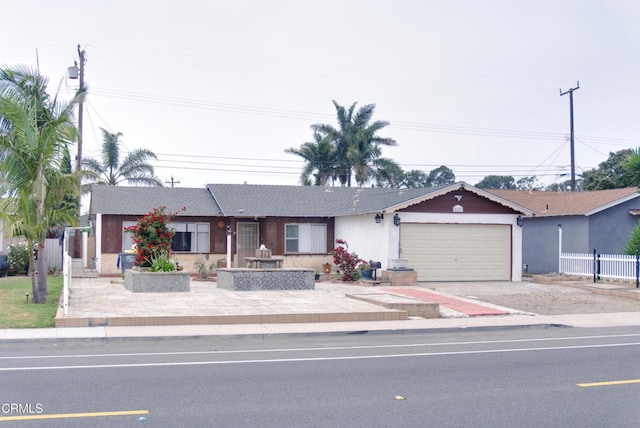 4127 S C St, Oxnard, CA 93033 - ranch-style house with a garage, concrete driveway, and stucco siding
