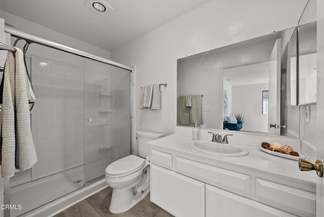 640 Orwell Ln, Ventura, CA 93003 - full bath featuring a shower stall, vanity, and wood finished floors