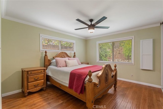 1827 Amelia Ave, San Pedro, CA 90731 - bedroom with multiple windows, hardwood / wood-style floors, crown molding, and ceiling fan