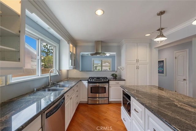 1827 Amelia Ave, San Pedro, CA 90731 - kitchen featuring appliances with stainless steel finishes, island range hood, glass insert cabinets, white cabinetry, and crown molding