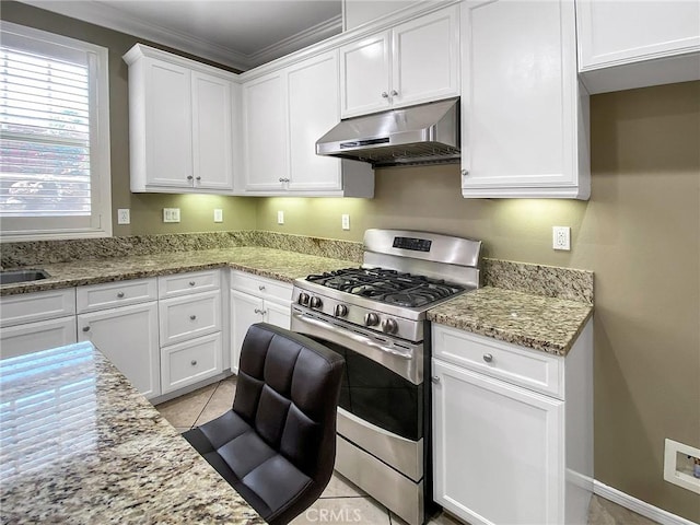 3318 Ridge Park Ct, Long Beach, CA 90804 - kitchen featuring stainless steel gas range oven, under cabinet range hood, white cabinetry, light stone countertops, and light tile patterned floors