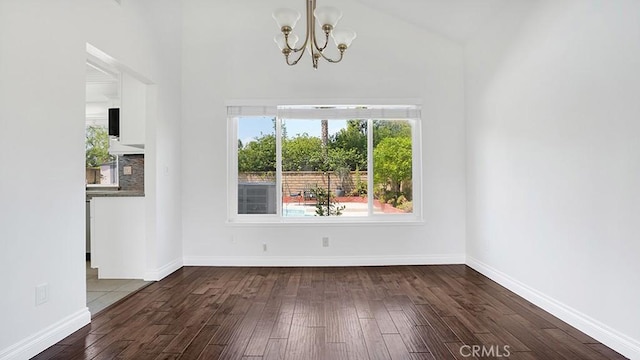 25866 Greenhill, Lake Forest, CA 92630 - unfurnished dining area featuring a chandelier, dark wood finished floors, and high vaulted ceiling