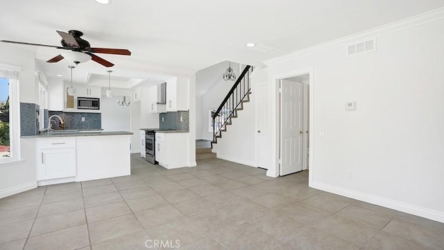 25866 Greenhill, Lake Forest, CA 92630 - kitchen with stainless steel appliances, backsplash, a ceiling fan, white cabinetry, and crown molding