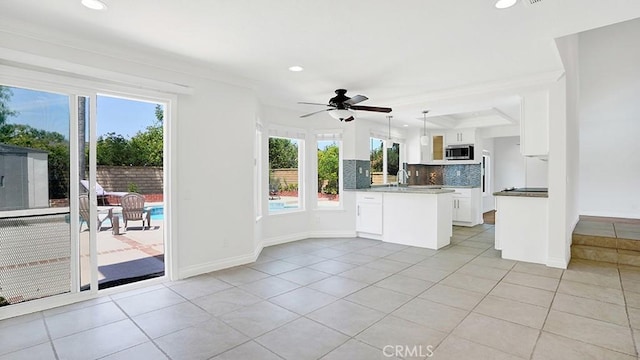 25866 Greenhill, Lake Forest, CA 92630 - kitchen with stainless steel microwave, recessed lighting, ceiling fan, light tile patterned floors, and tasteful backsplash