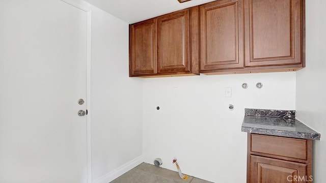 25866 Greenhill, Lake Forest, CA 92630 - washroom with hookup for a gas dryer, cabinet space, electric dryer hookup, and tile patterned flooring