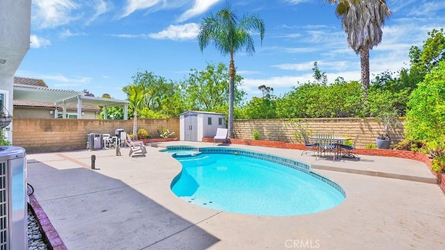 25866 Greenhill, Lake Forest, CA 92630 - view of pool with a storage shed, a patio area, a fenced backyard, and a pool with connected hot tub