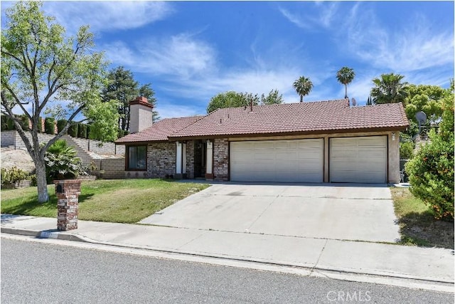 6318 Westview Dr, Riverside, CA 92506 - single story home featuring a tile roof, driveway, an attached garage, a front lawn, and a chimney