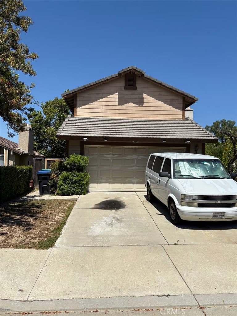 2598 Highgate Ct, Chino Hills, CA 91709 - view of front of home with a tile roof, concrete driveway, and a garage