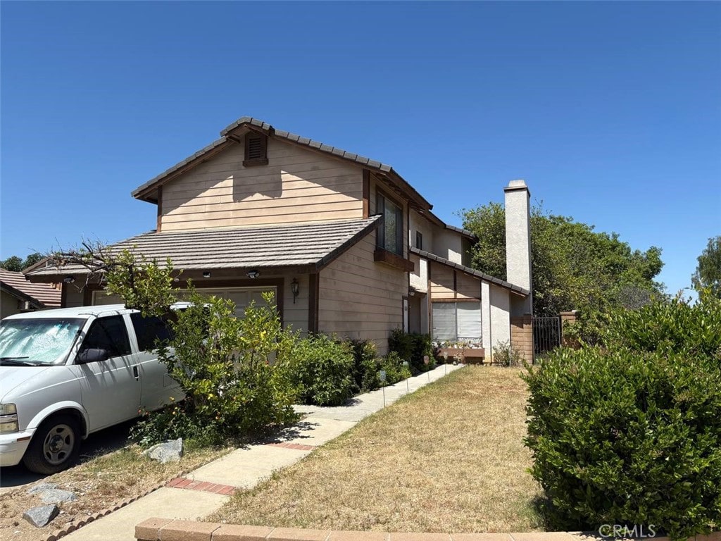 2598 Highgate Ct, Chino Hills, CA 91709 - view of home's exterior with a chimney