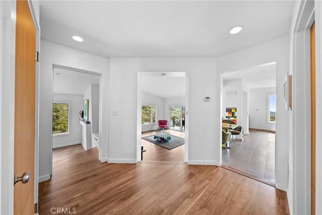 1372 Morningside Dr, Laguna Beach, CA 92651 - entryway featuring healthy amount of natural light, wood finished floors, and recessed lighting